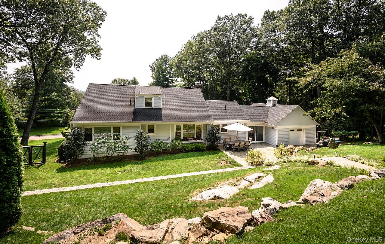36 Pond Hill Road Chappaqua, NY 10514 - Photo 26 of 32 a front view of house with yard and green space
