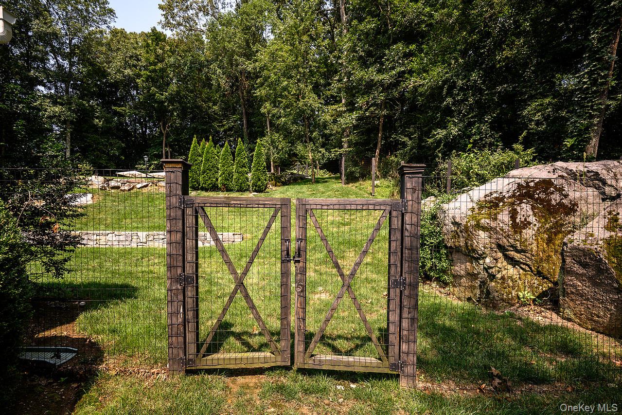 36 Pond Hill Road Chappaqua, NY 10514 - Photo 28 of 32 a view of swimming pool from a garden