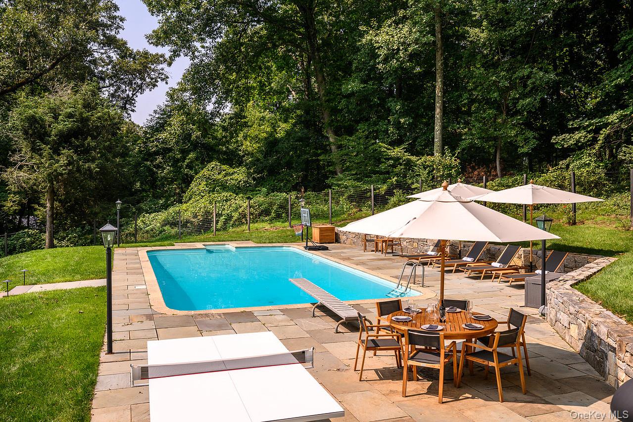 36 Pond Hill Road Chappaqua, NY 10514 - Photo 32 of 32 a view of outdoor space yard swimming pool and patio