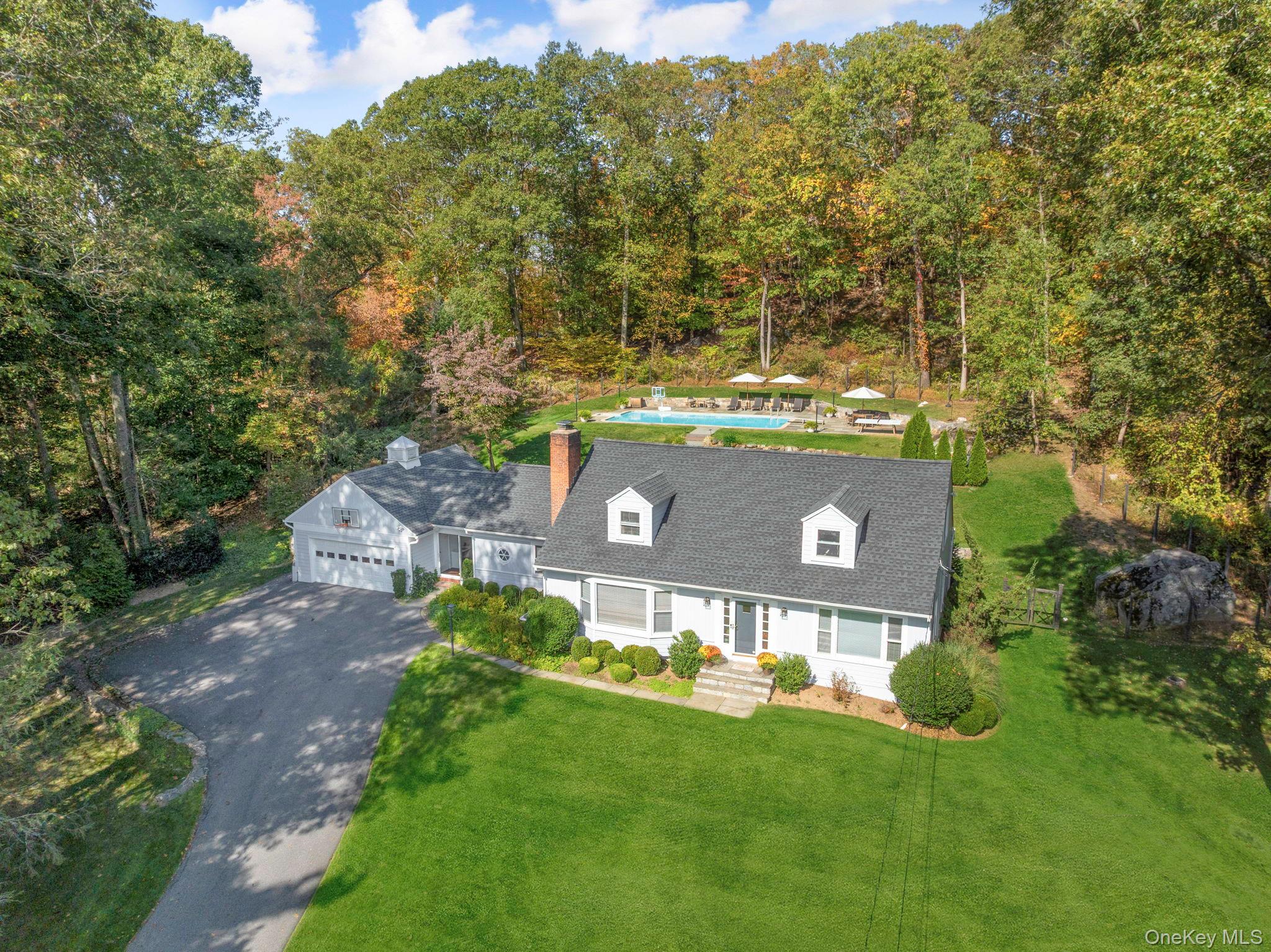 36 Pond Hill Road Chappaqua, NY 10514 - Photo 4 of 32 a view of a house with a yard