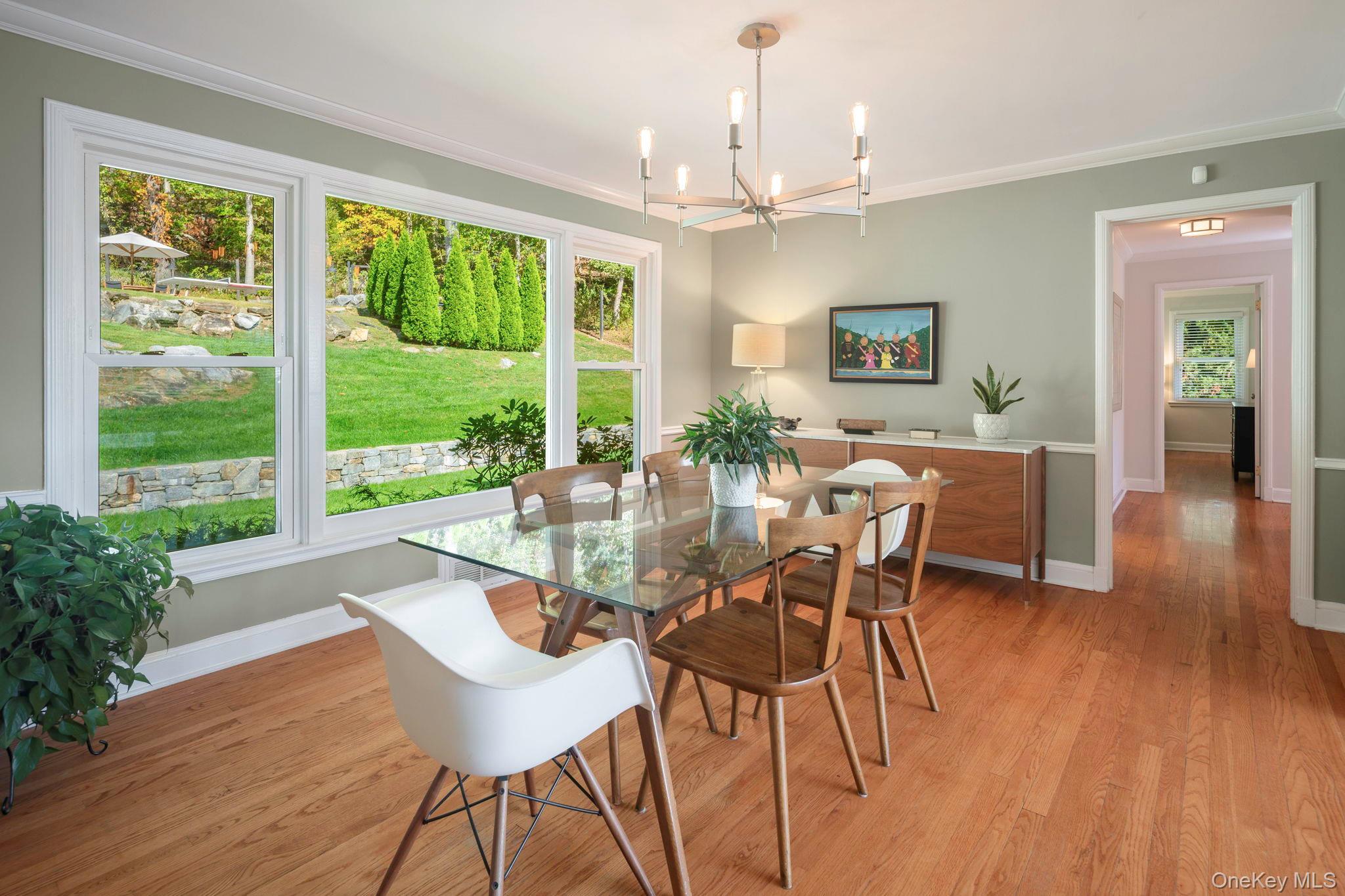 36 Pond Hill Road Chappaqua, NY 10514 - Photo 9 of 32 a view of a dining room with furniture window and wooden floor