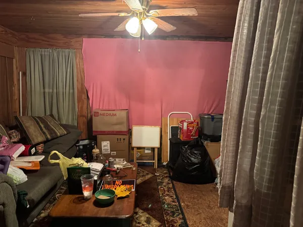 a room with furniture and gym equipment