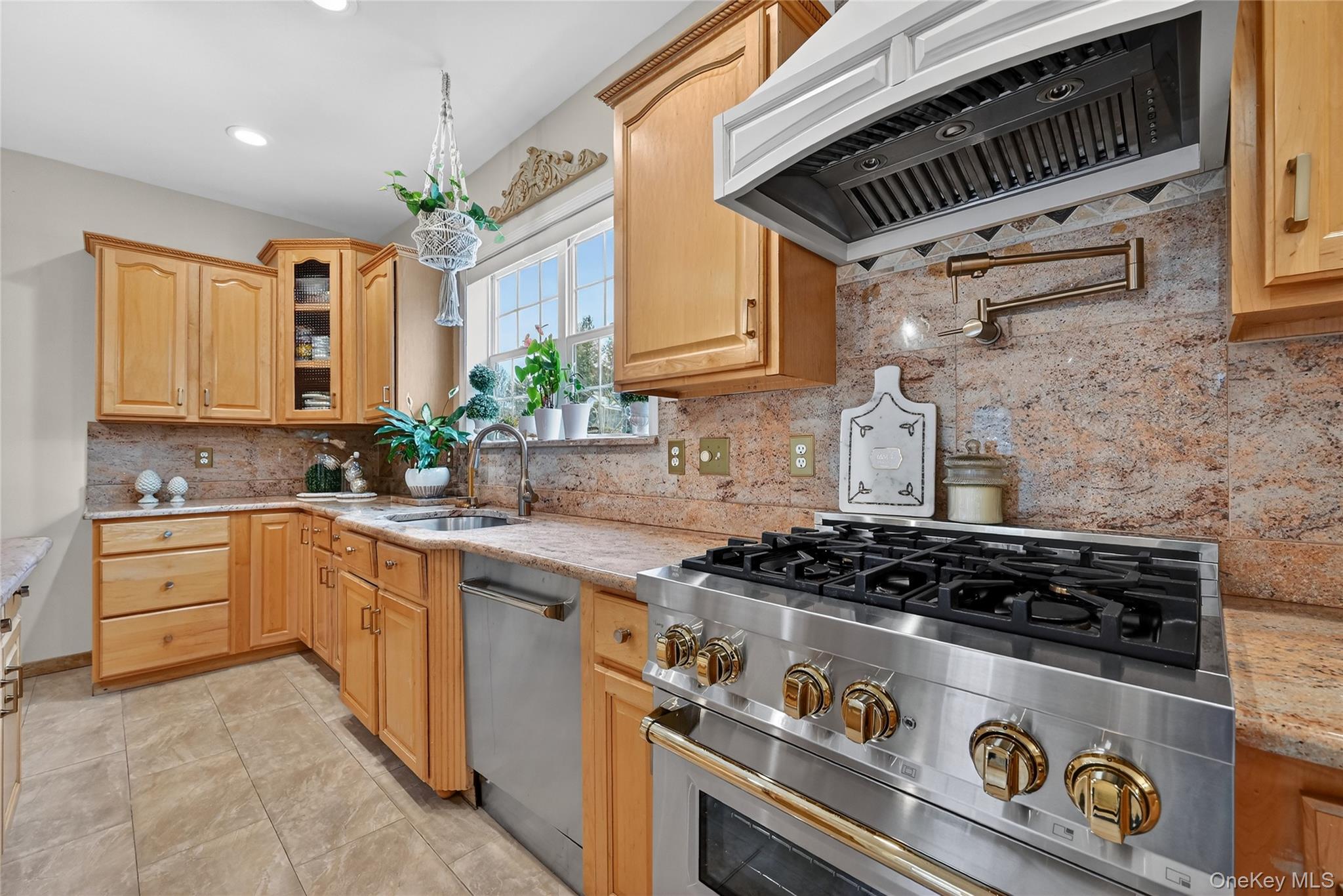 16 Kukas Road Monticello, NY 12701 - Photo 15 of 50 a kitchen with granite countertop a stove and a sink
