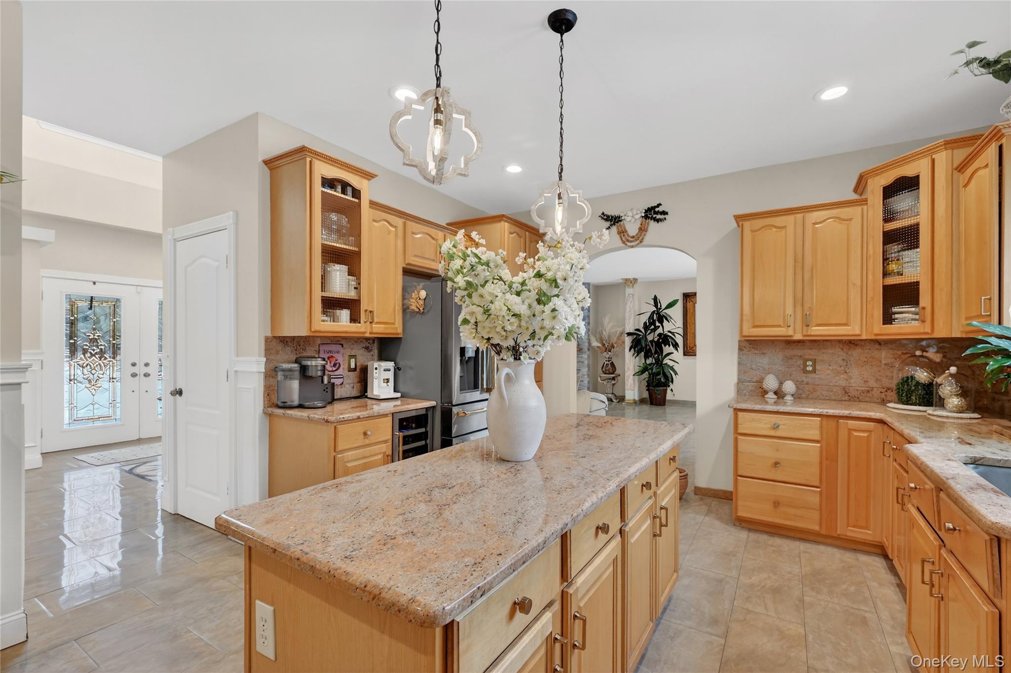 16 Kukas Road Monticello, NY 12701 - Photo 16 of 50 a kitchen with a stove a sink a center island and living room view