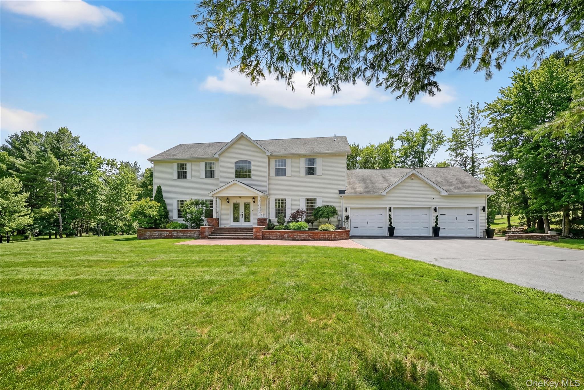 16 Kukas Road Monticello, NY 12701 - Photo 2 of 50 a front view of a house with garden
