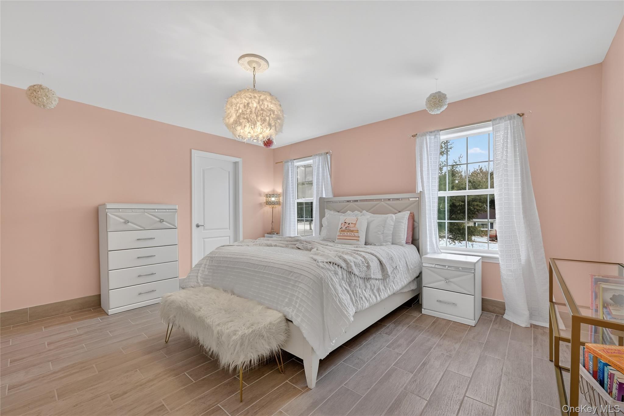 16 Kukas Road Monticello, NY 12701 - Photo 36 of 50 a bedroom with a bed chandelier and a window