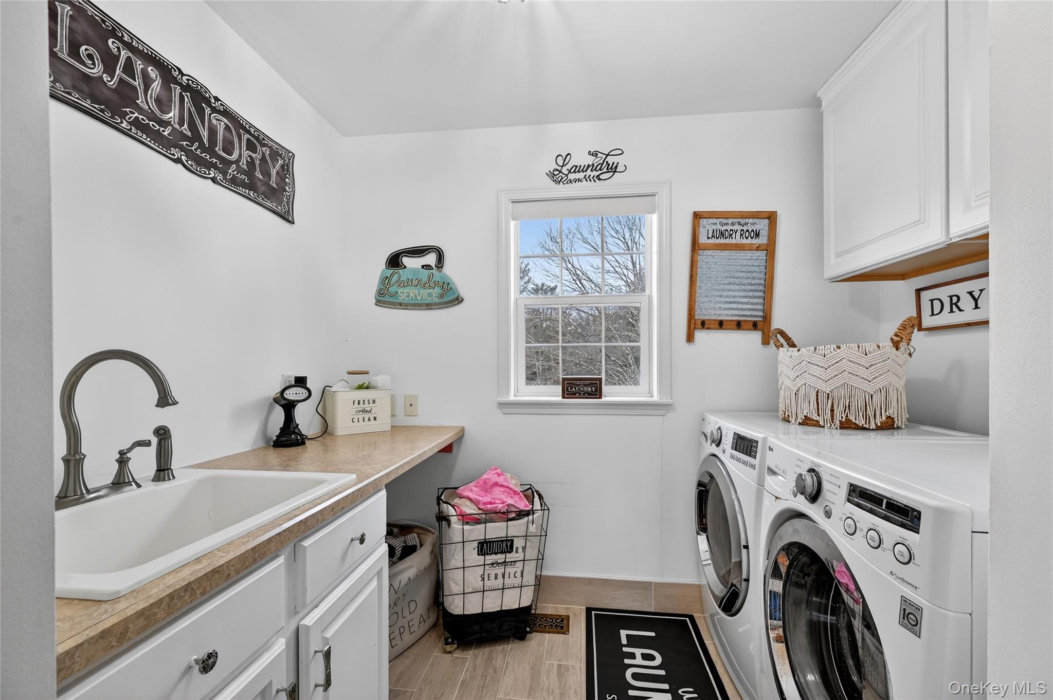 16 Kukas Road Monticello, NY 12701 - Photo 41 of 50 a utility room with sink dryer and washer