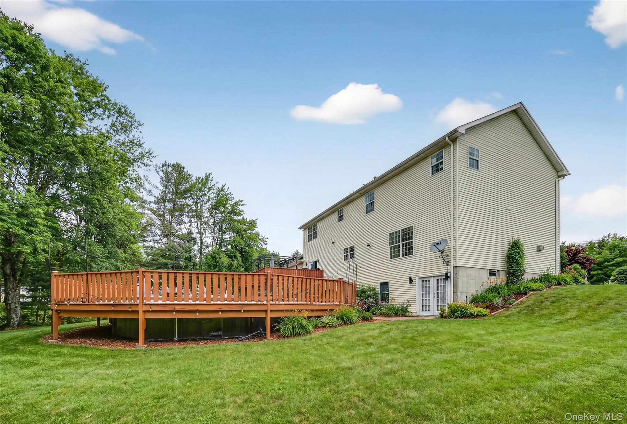 16 Kukas Road Monticello, NY 12701 - Photo 49 of 50 a view of a house with a yard and deck