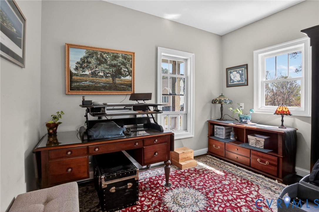 4 Walters Lane Poquoson, VA 23662 - Photo 15 of 35 a room with furniture and paintings on the wall