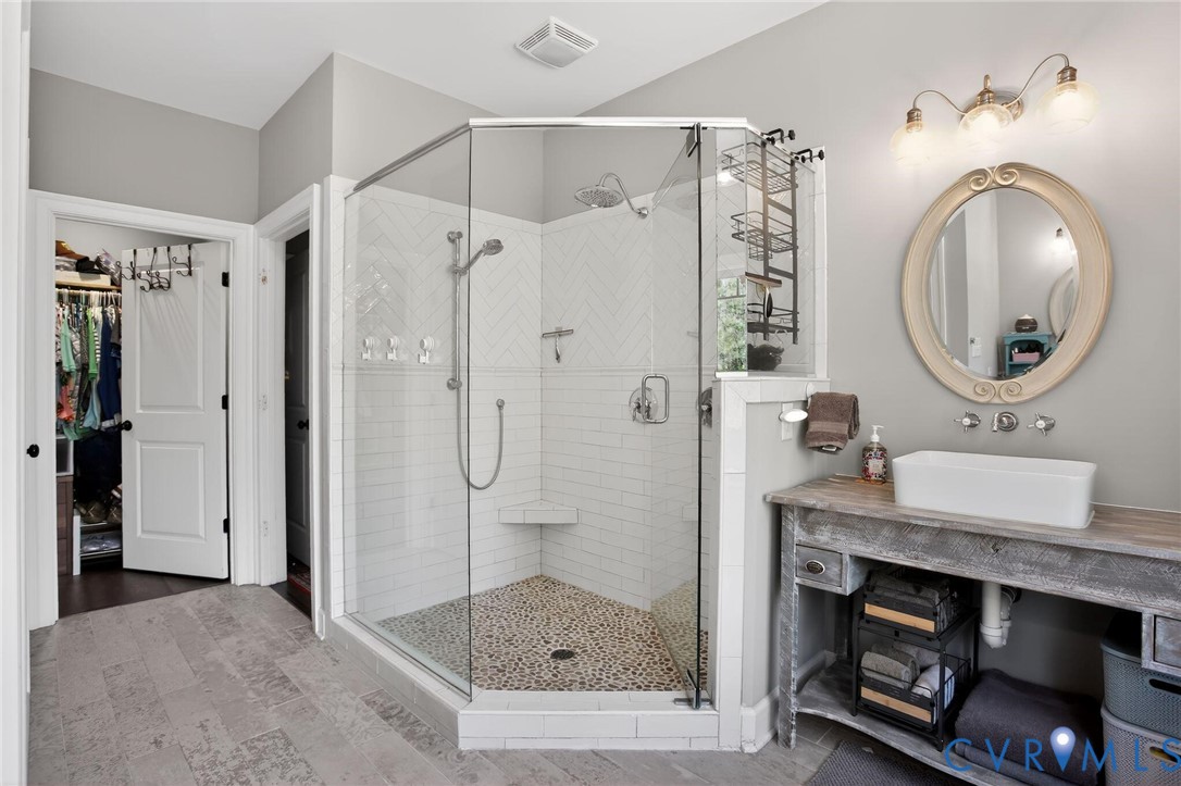 4 Walters Lane Poquoson, VA 23662 - Photo 19 of 35 a bathroom with a sink a toilet and shower