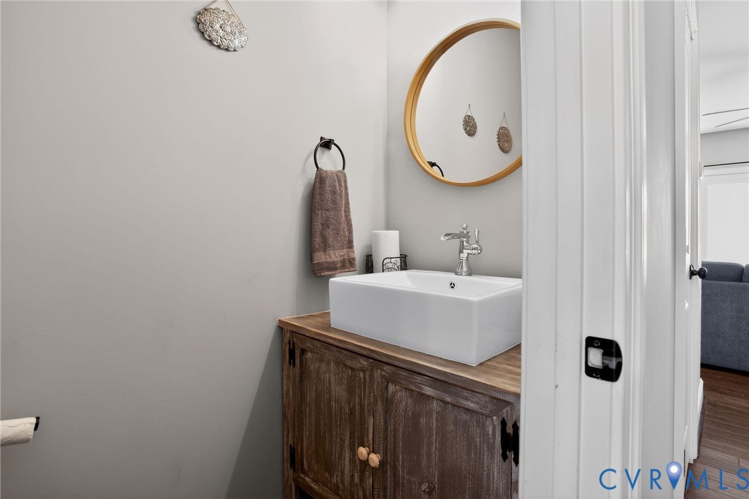 4 Walters Lane Poquoson, VA 23662 - Photo 22 of 35 a bathroom with a sink and a mirror