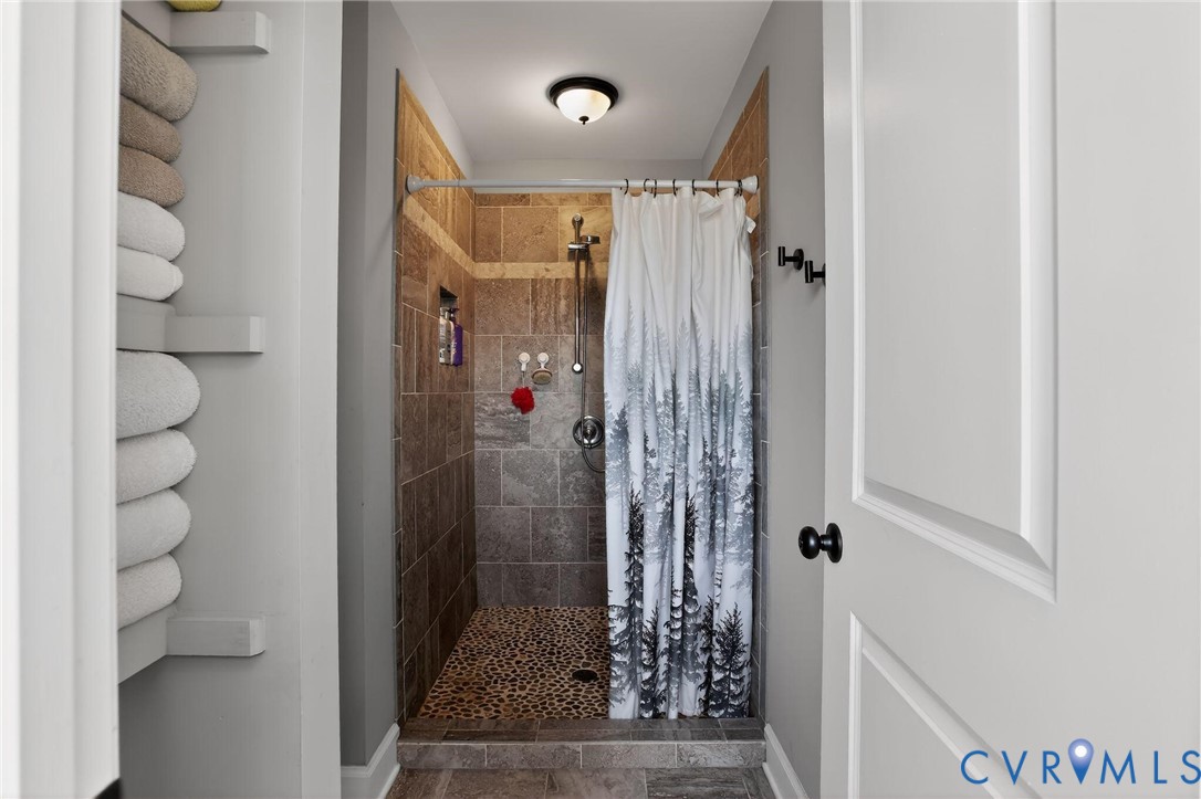 4 Walters Lane Poquoson, VA 23662 - Photo 25 of 35 a bathroom with a shower