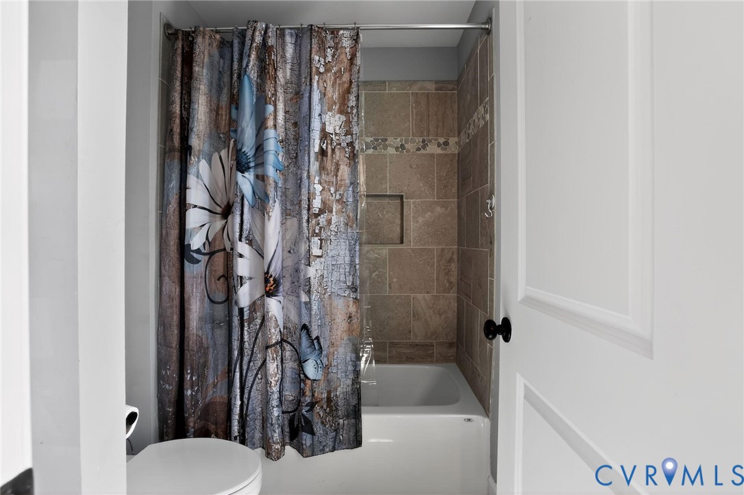 4 Walters Lane Poquoson, VA 23662 - Photo 29 of 35 a bathroom with a toilet and a shower