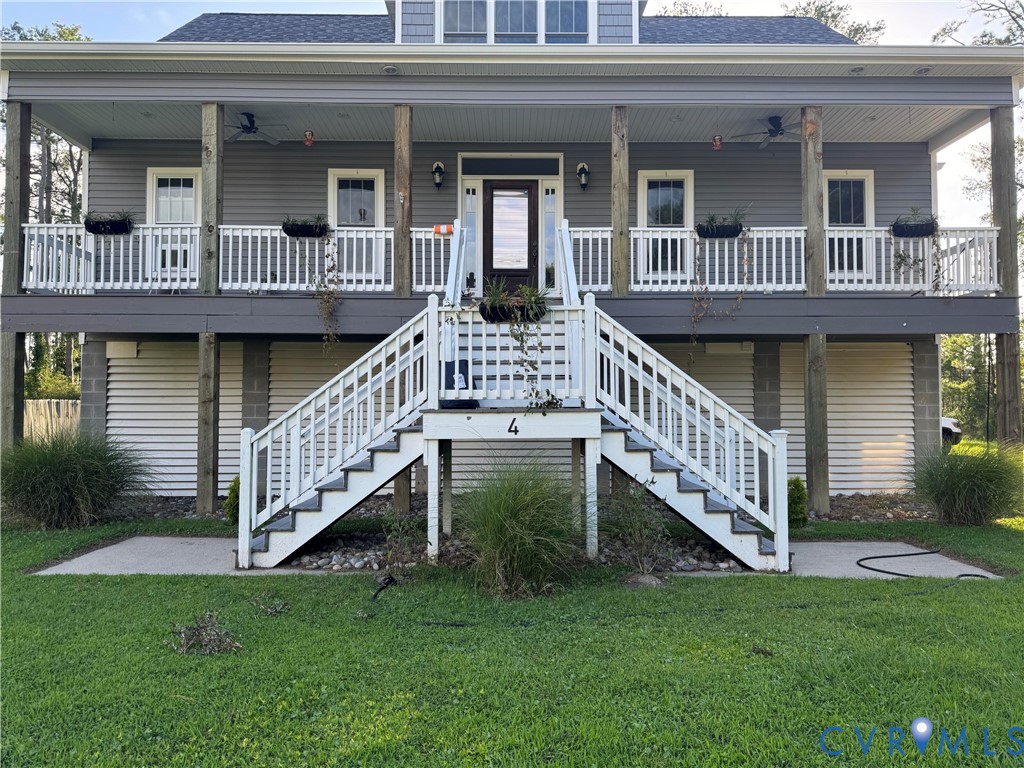 4 Walters Lane Poquoson, VA 23662 - Photo 4 of 35 a view of house with a yard and deck