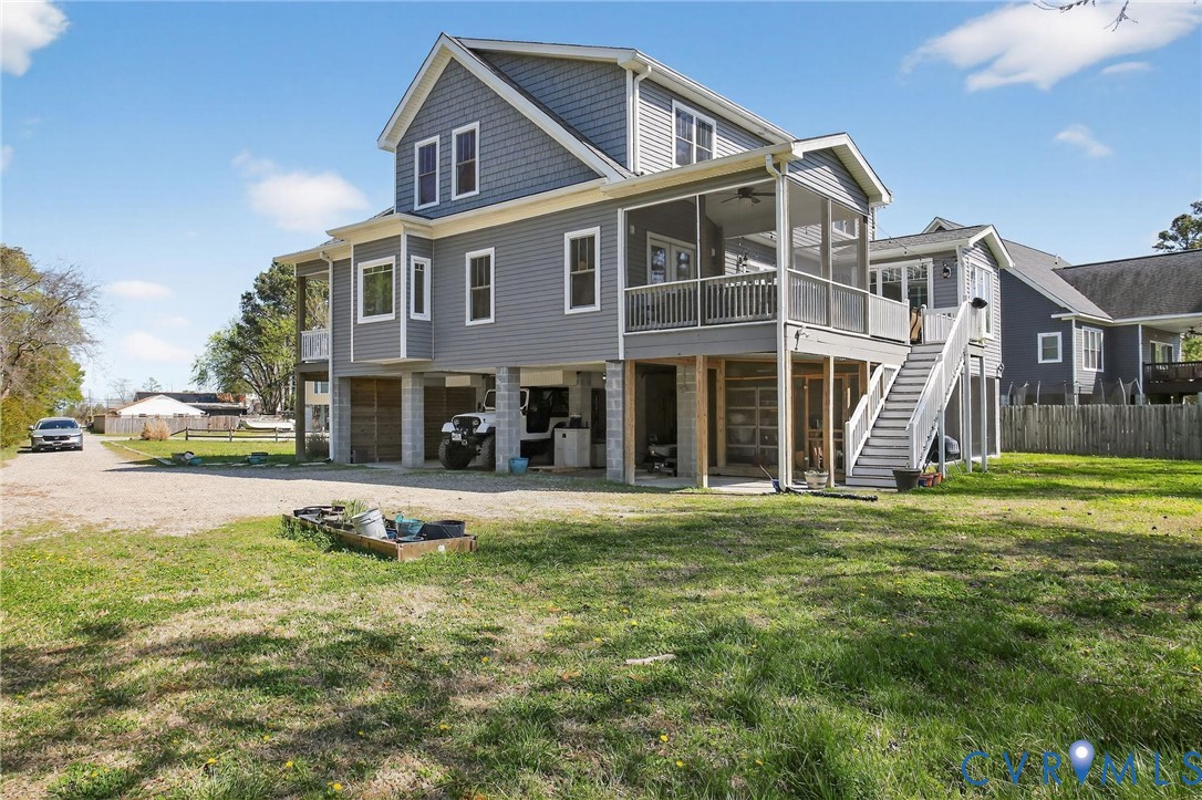 4 Walters Lane Poquoson, VA 23662 - Photo 5 of 35 a front view of a house with a yard