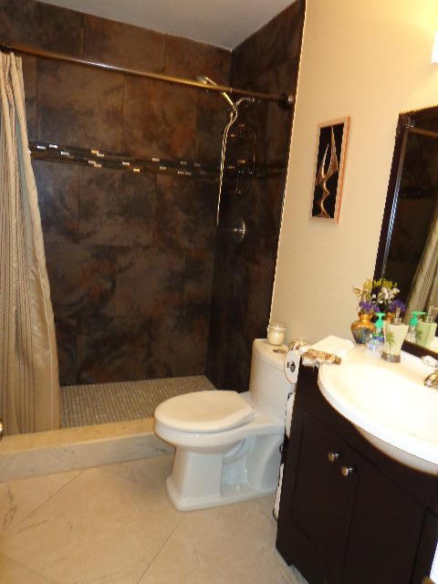 22485 Southwest 61st Way, Unit 235 Boca Raton, FL 33428 - Photo 18 of 22 Remodeled guest bathroom