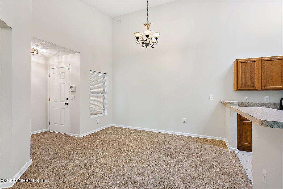 7920 Merrill Road, Unit 1014 Jacksonville, FL 32277 - Photo 4 of 12 04-Dining Area