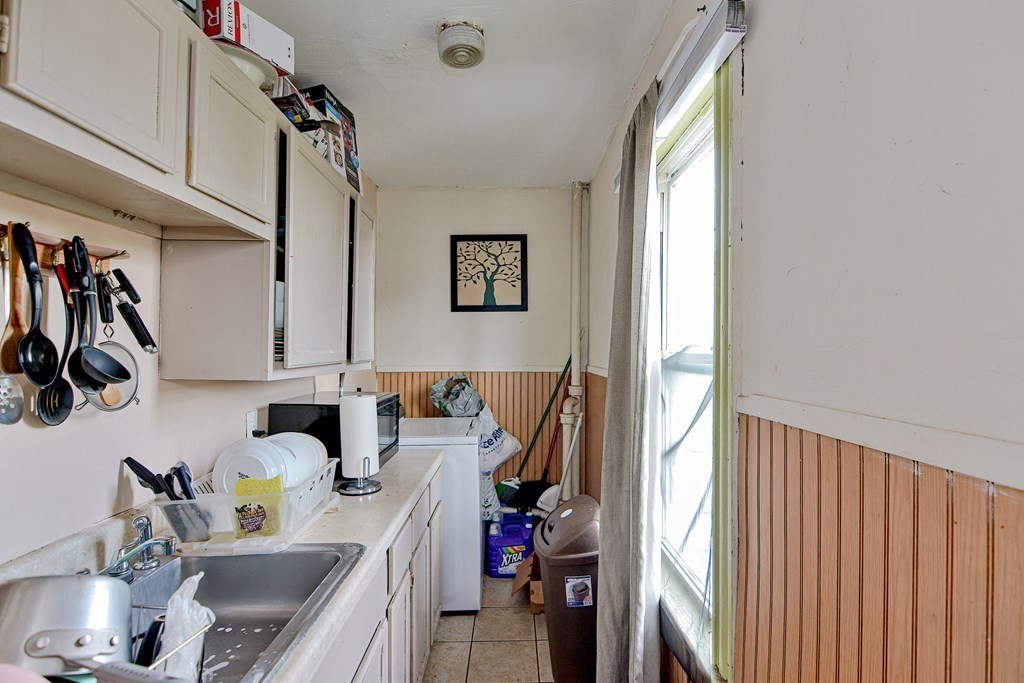 83 Ward Street Worcester, MA 01610 - Photo 20 of 28 a view of a kitchen with appliances and cabinets