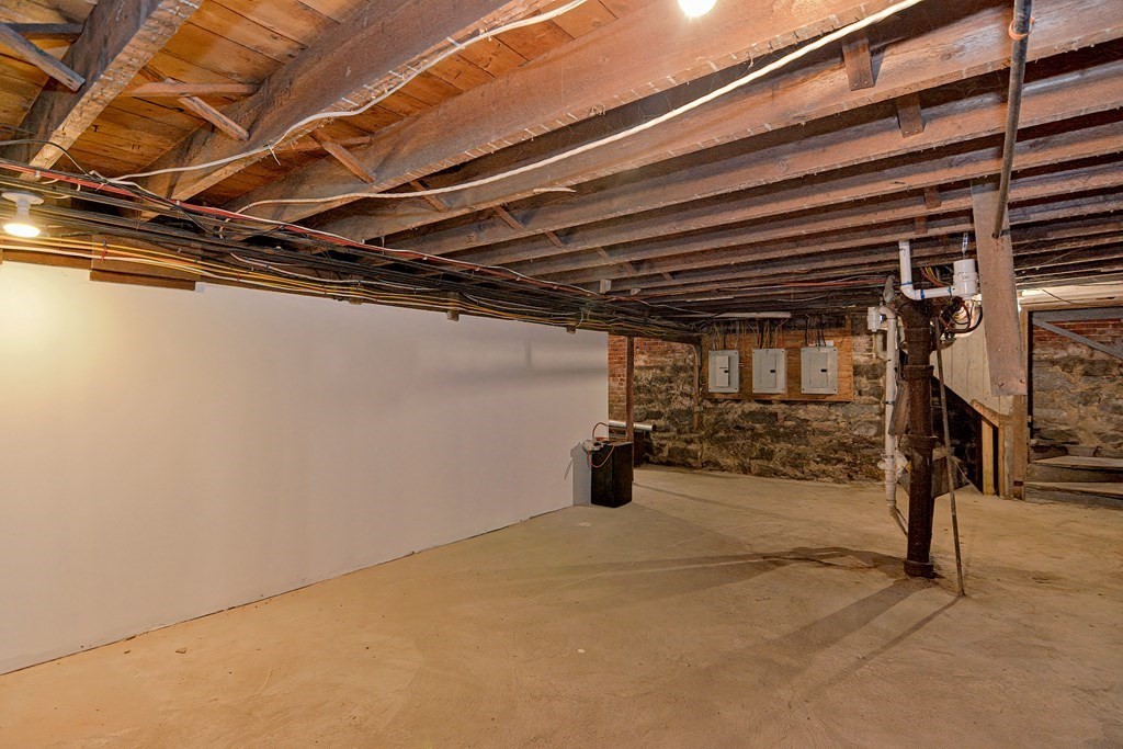 83 Ward Street Worcester, MA 01610 - Photo 24 of 28 a view of a room with wooden walls