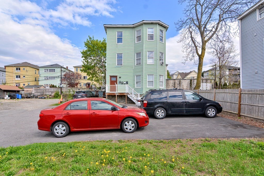 83 Ward Street Worcester, MA 01610 - Photo 26 of 28 a cars parked in front of a house