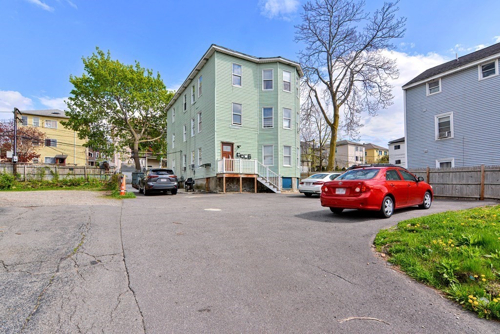 83 Ward Street Worcester, MA 01610 - Photo 27 of 28 a view of cars parked in front of a building