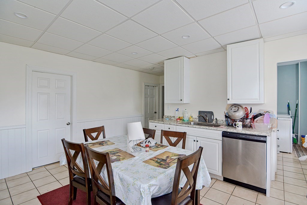 83 Ward Street Worcester, MA 01610 - Photo 6 of 28 a view of a dining room that has a table and chairs in it
