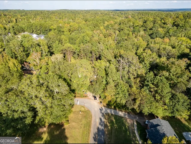 a view of a building with a yard