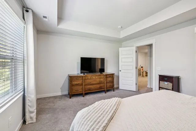 a bathroom with a double vanity sink and mirror