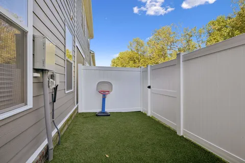 a view of a chair and table in the balcony