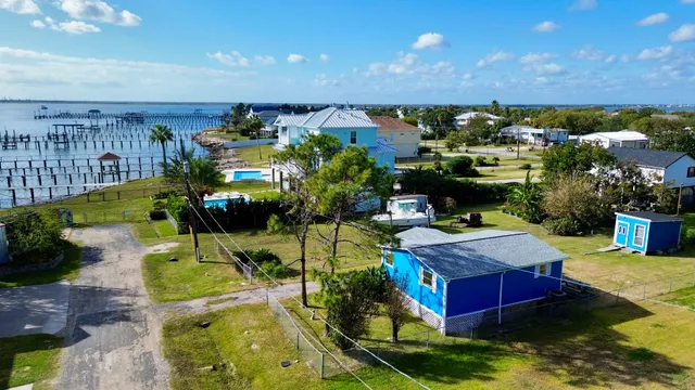 a view of a swimming pool with a patio