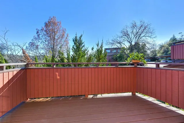 a view of outdoor space with wooden fence