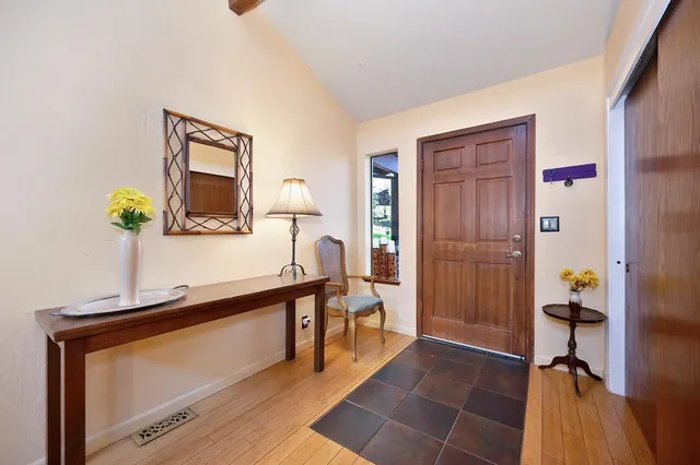 a view of a living room and bathroom