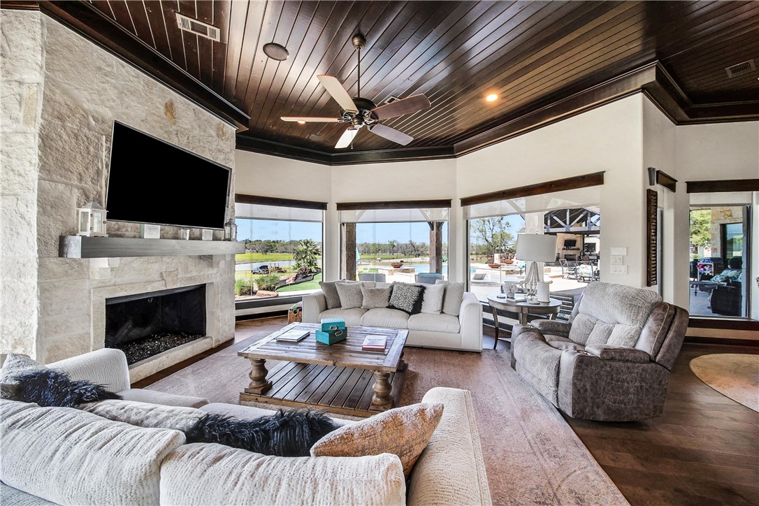 2289 Old Dobbin Road Montgomery, TX 77316 - Photo 18 of 50 a living room with furniture fireplace and flat screen tv