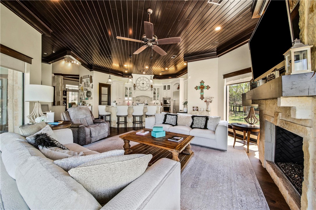 2289 Old Dobbin Road Montgomery, TX 77316 - Photo 19 of 50 a living room with furniture and fireplace
