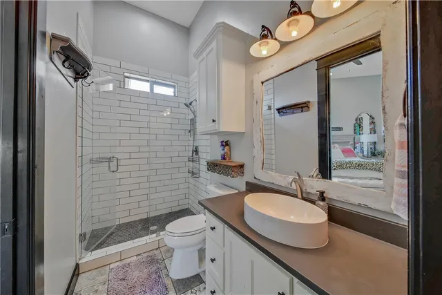 a view of a chairs and table in the patio