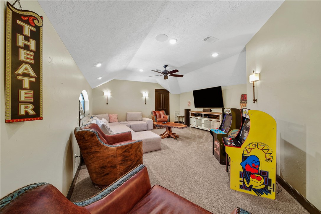 2289 Old Dobbin Road Montgomery, TX 77316 - Photo 29 of 50 a living room with furniture and a flat screen tv