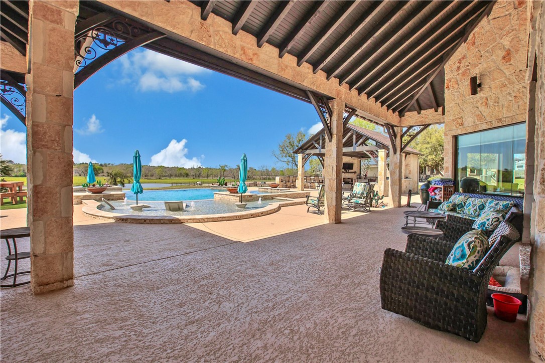 2289 Old Dobbin Road Montgomery, TX 77316 - Photo 30 of 50 a view of swimming pool with outdoor seating and a patio