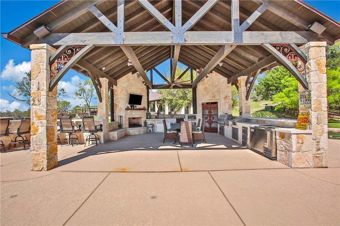 2289 Old Dobbin Road Montgomery, TX 77316 - Photo 31 of 50 a view of a chairs and table in the patio