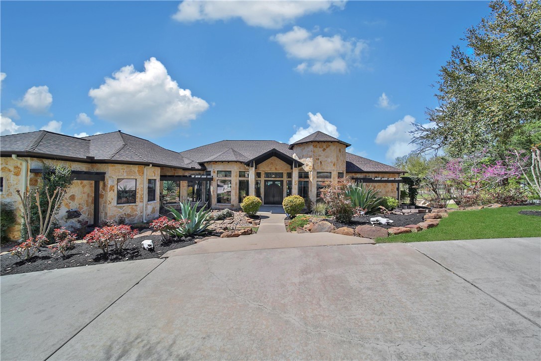2289 Old Dobbin Road Montgomery, TX 77316 - Photo 7 of 50 a view of a house with sitting area and garden view