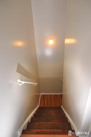 a view of a room with racks on the wall