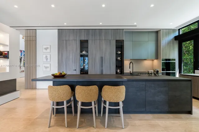 a bathroom with a sink toilet and mirror