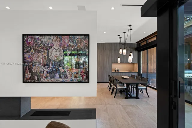 a bedroom with a large bed and a flat screen tv