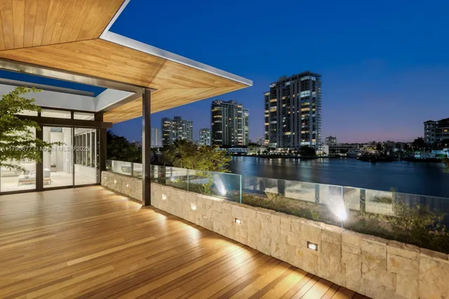 a bathroom with a toilet sink and shower