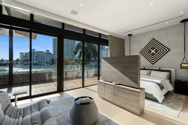 a view of a backyard with sitting area