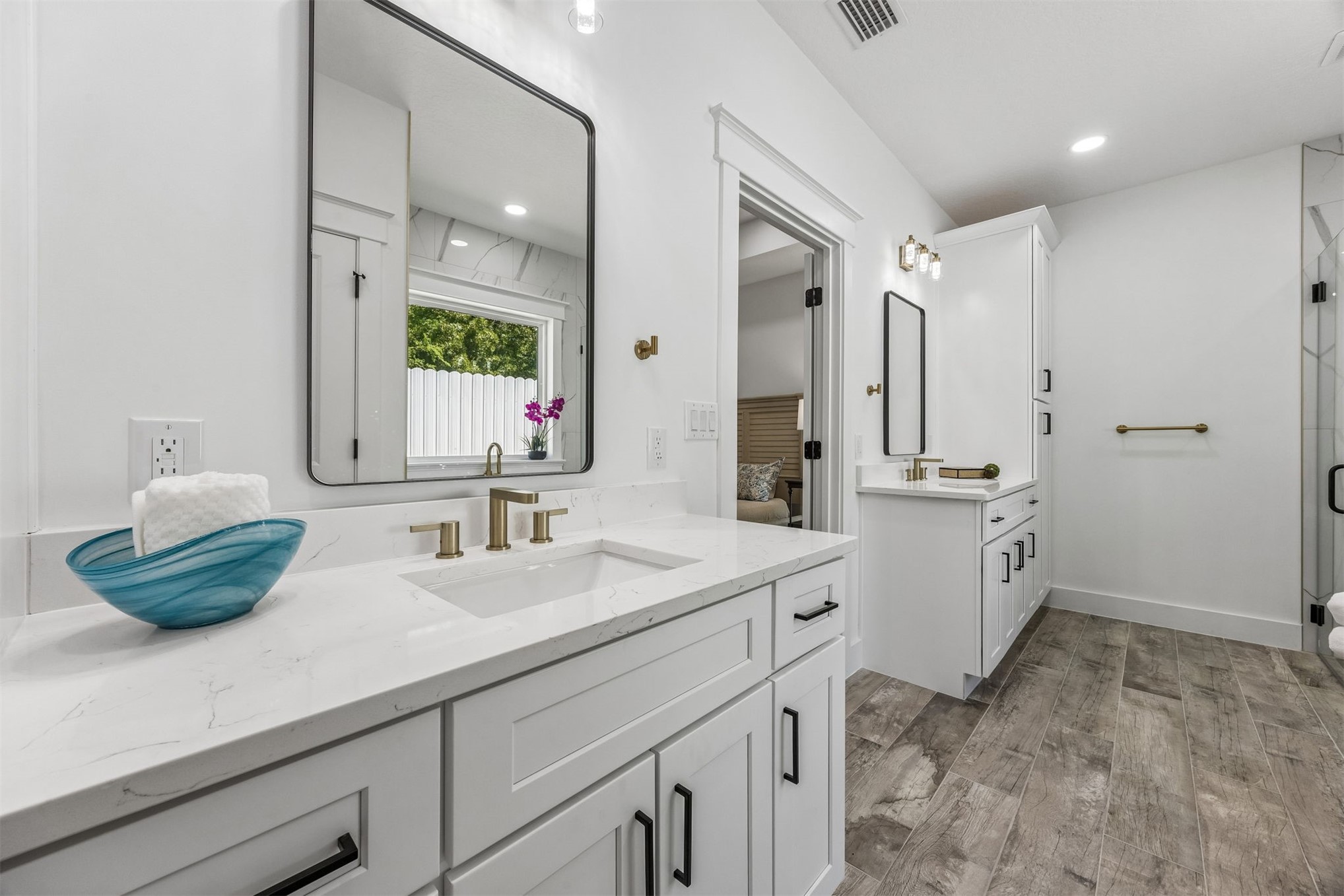 95121 North Ellis Landing Road Fernandina Beach, FL 32034 - Photo 20 of 37 a bathroom with a double vanity sink mirror and