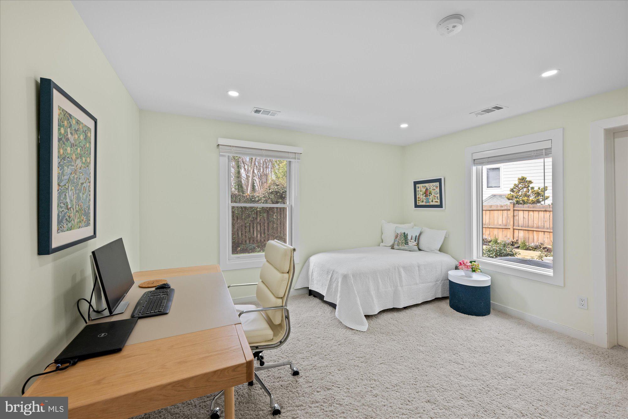 6700 Rannoch Road Bethesda, MD 20817 - Photo 23 of 36 a bedroom with a bed and wooden floor