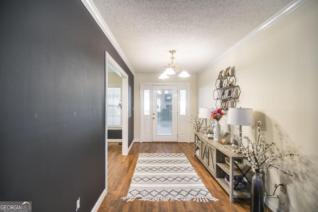 201 Strawberry Circle Dublin, GA 31021 - Photo 18 of 40 a view of a hallway with a flower pot