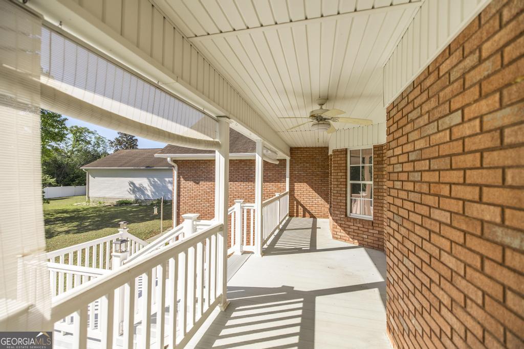 201 Strawberry Circle Dublin, GA 31021 - Photo 2 of 40 a view of a balcony with staircase
