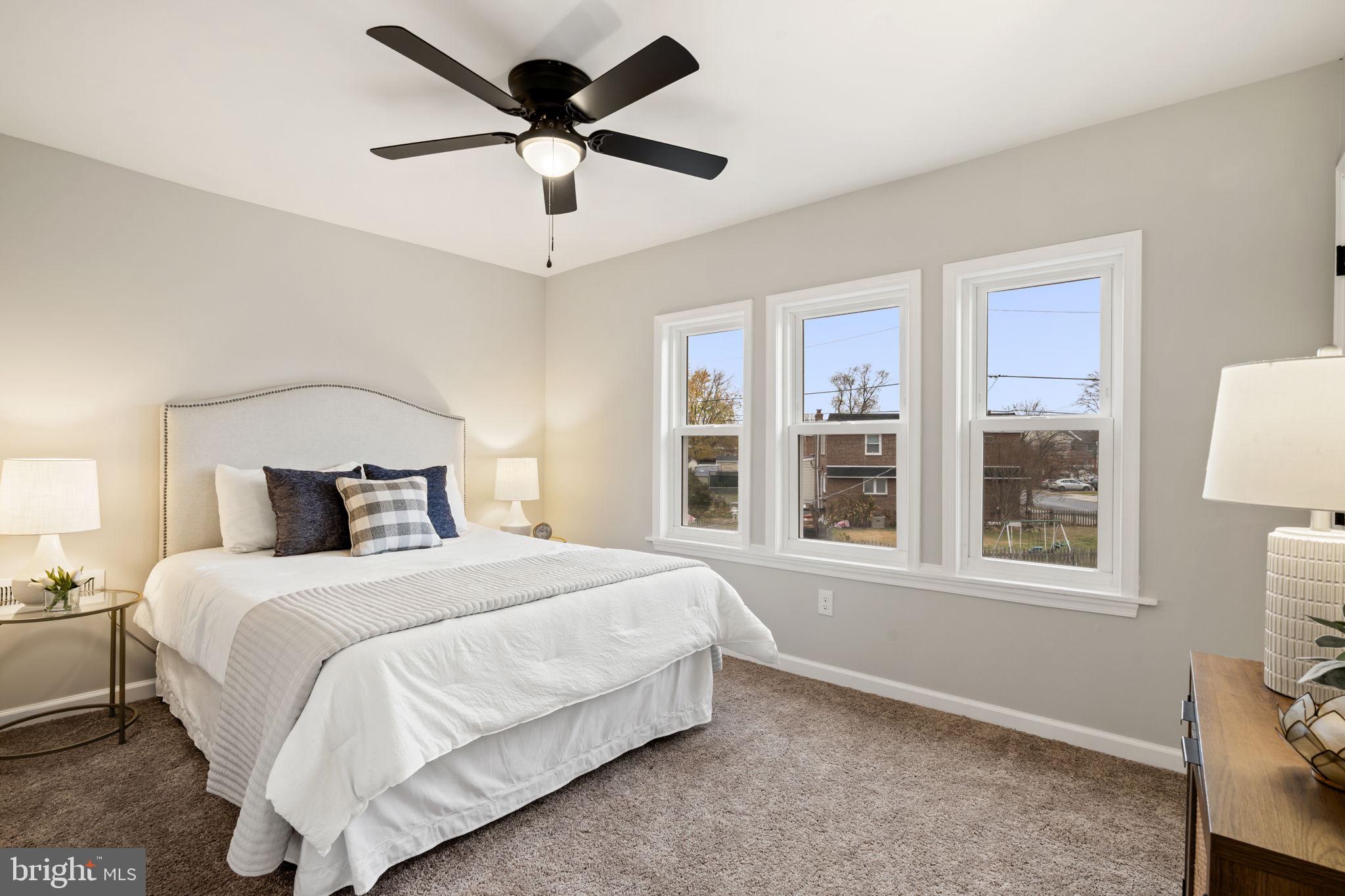 242 Willard Drive Ridley Park, PA 19078 - Photo 61 of 72 a bedroom with a large bed and a window