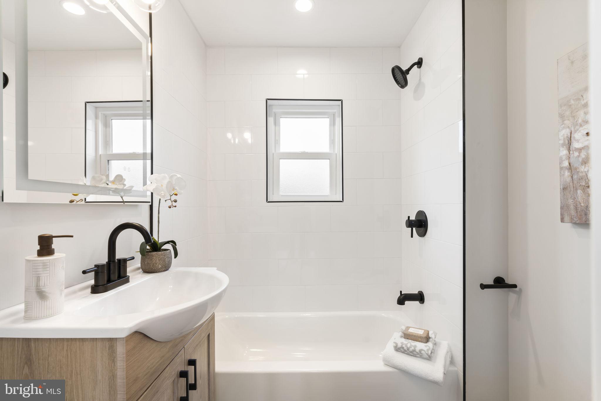 242 Willard Drive Ridley Park, PA 19078 - Photo 62 of 72 a bathroom with a sink and a bathtub